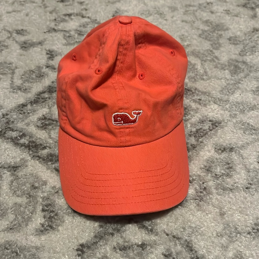 Orange hat with floral under bill